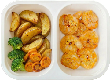 Grilled shrimps with potato wedges and broccoli